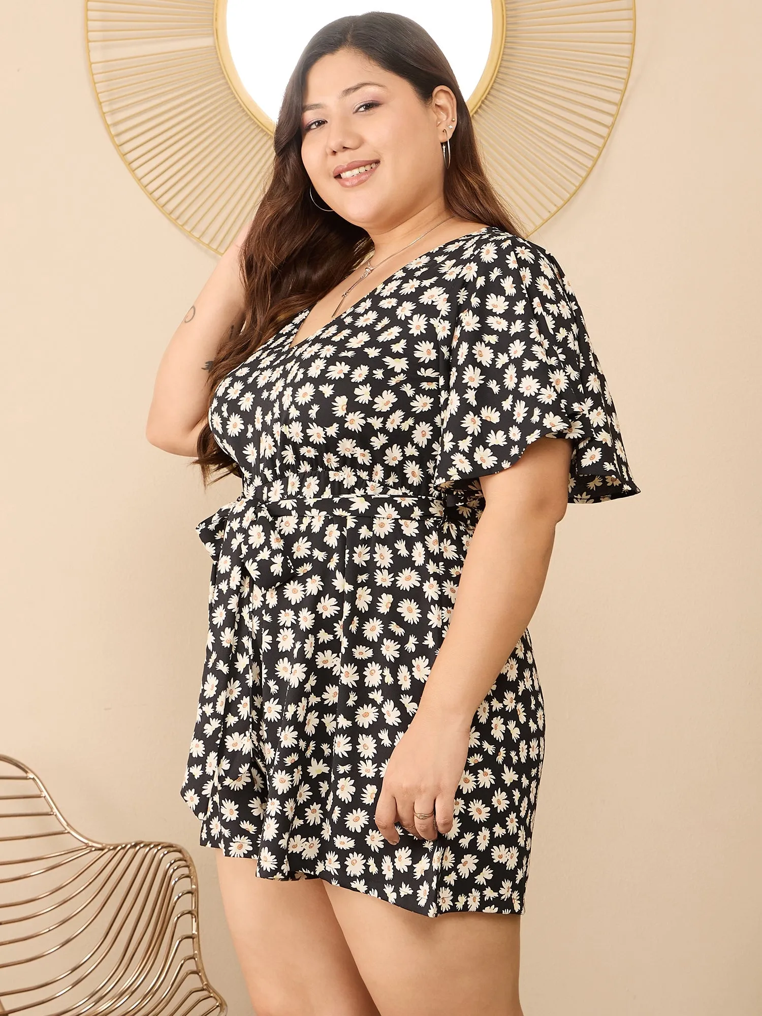 Berrylush Curve Women Black & White Floral Printed V-Neck Flared Sleeves Tie-Up Waist Back Keyhole Straight Hem Mini Jumpsuit