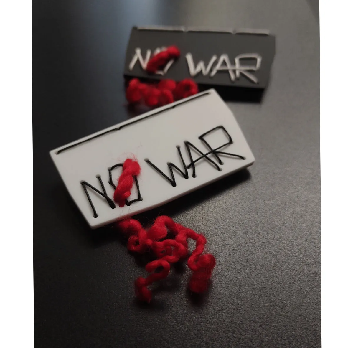 NO WAR set of 2 Hand embroidered acrylic brooches Black White